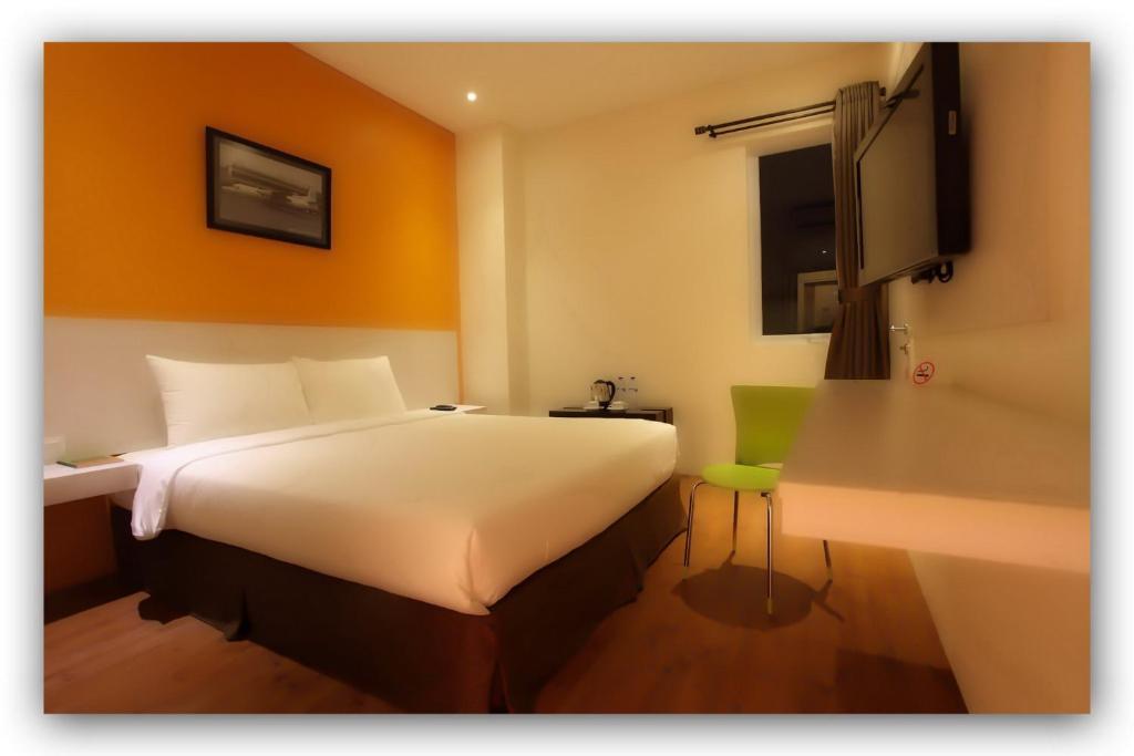 Hotel Dragon Inn Kemayoran Τζακάρτα Δωμάτιο φωτογραφία
